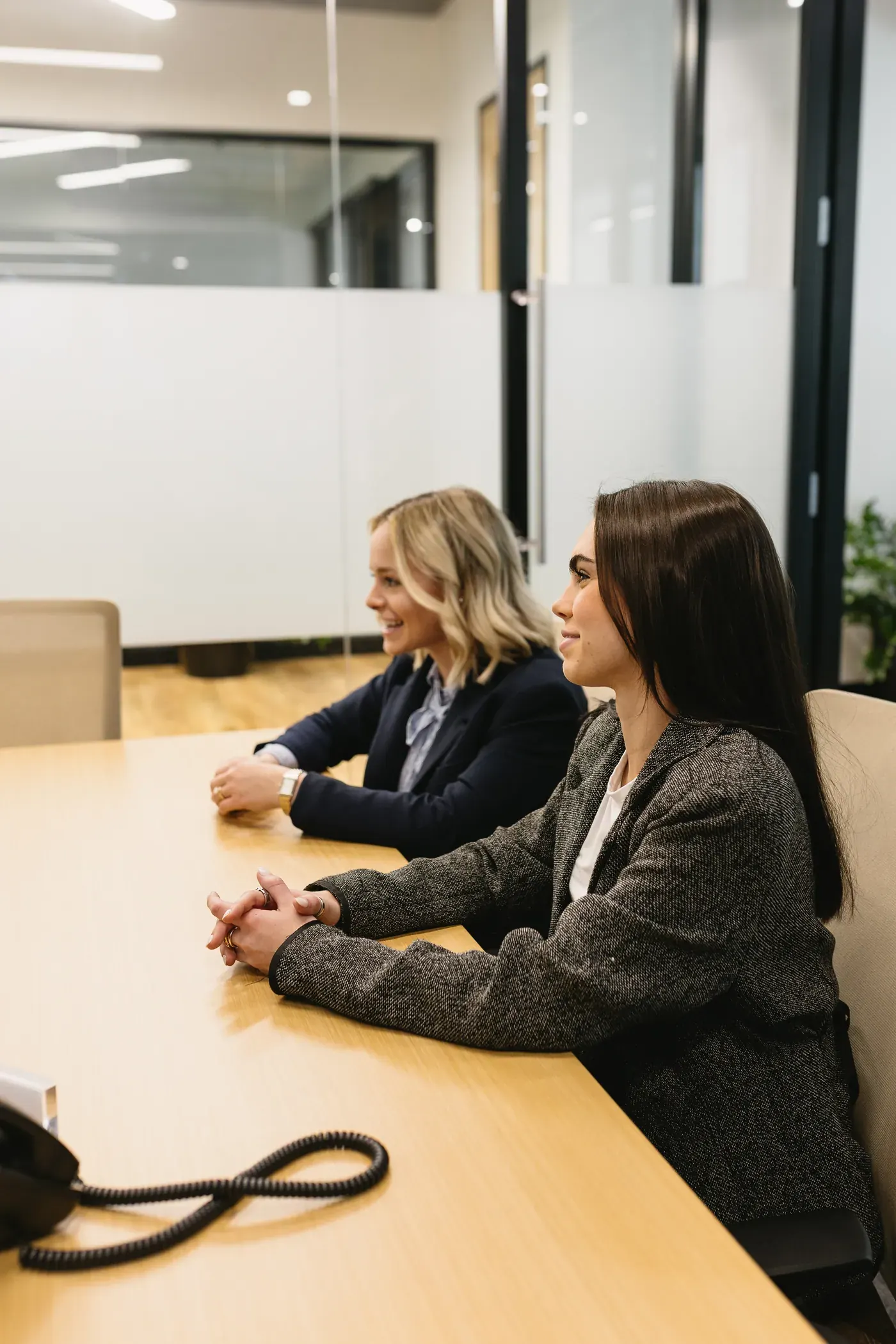 Team members meeting at a conference table